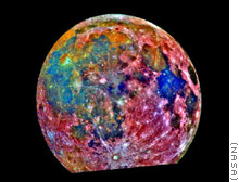 The Galileo probe used three color filters to shoot this composite image. Reds correspond with highlands, blues and oranges with ancient lava flows.